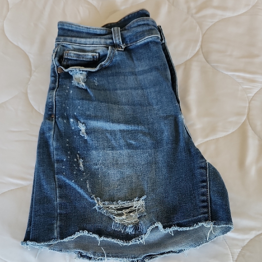 Distressed Blue Denim Jeans